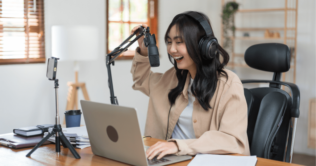 How to Start a Health and Wellness Podcast - Woman Recording Audio with Microphone
