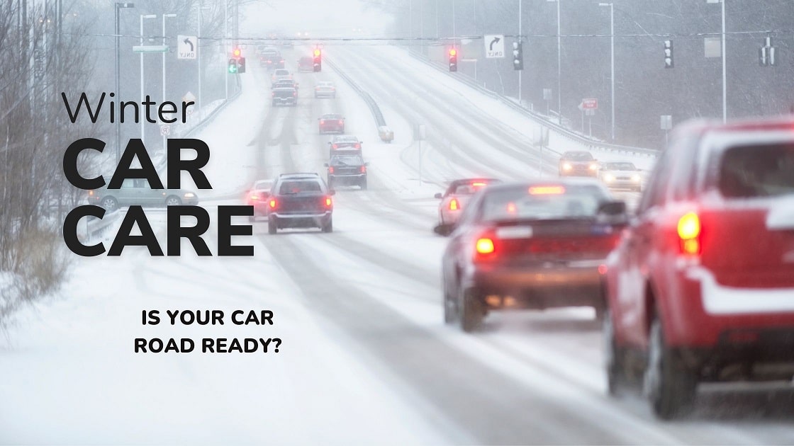 Winter Car Care Blog Banner - Red Cars and SUVs on Snowy Road