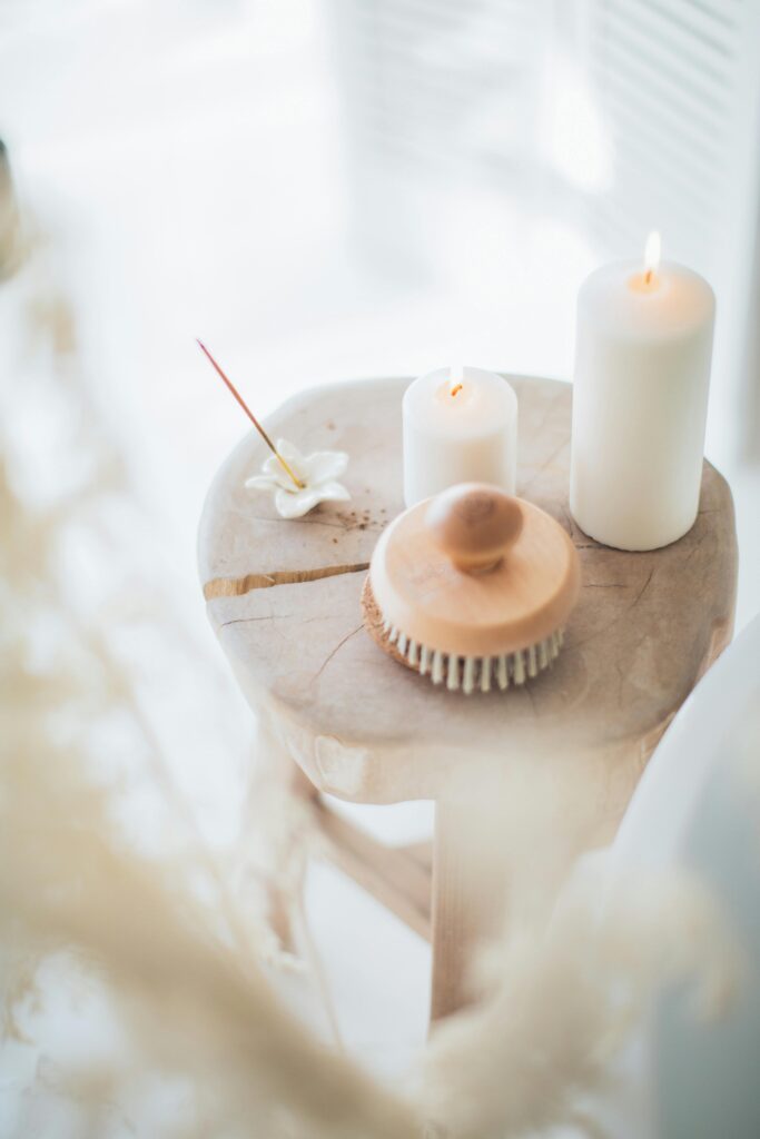 perfect-spa-getaway-brush-with-incense-and-candles-on-table
